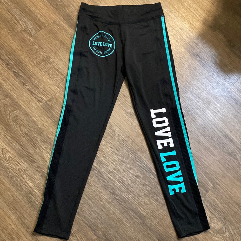 NWOT Black & aqua blue LOVE Leggings Sz M forever flawless Mesh sides bottom leg